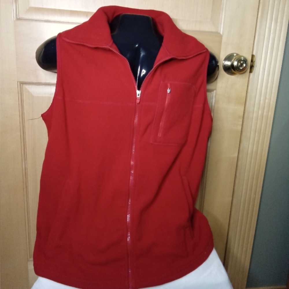 Women's full  zip  front fleece vest with little zip front pocket.